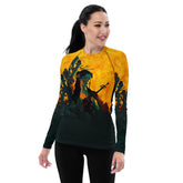 SurArt 78 Women's Rash Guard worn by a woman surfing in the ocean